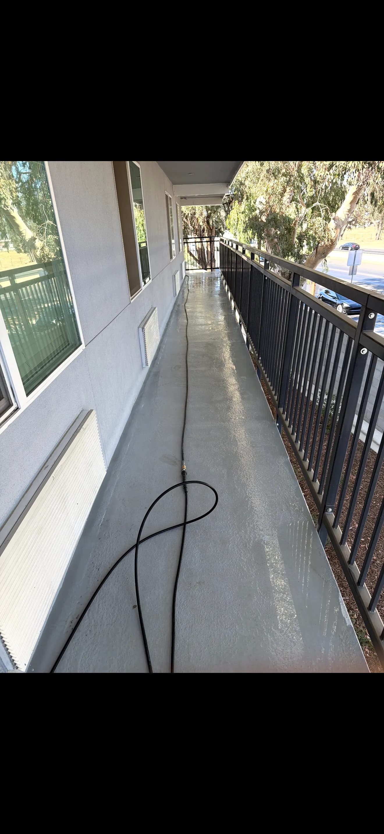 Concrete Pressure Washing and Window Cleaning at a Fresno Housing Property