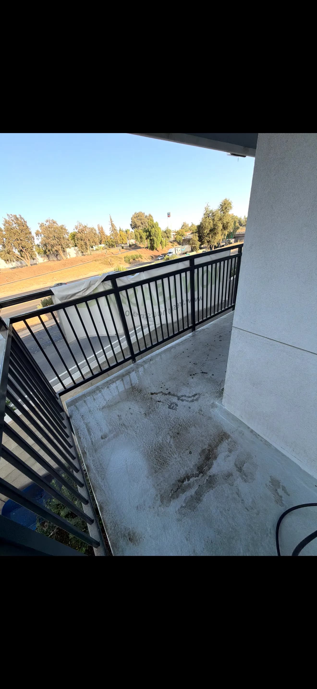 Concrete Pressure Washing and Window Cleaning at a Fresno Housing Property